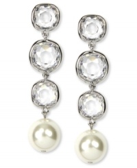 Crystal accents and white glass pearls shine bright on these Givenchy linear drop earrings. Crafted in imitation rhodium plated mixed metal. Approximate drop: 2-1/3 inches. Crystal accents and white glass pearls shine bright on these Givenchy linear drop earrings. Crafted in imitation rhodium plated mixed metal. Approximate drop: 2-1/3 inches.