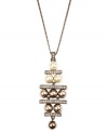 Amp up your glamour factor in Givenchy's stunning y-shaped pendant. Crafted in brown gold-plated mixed metal, pendant features glass pearls in blush and white tones. Approximate length: 16 inches + 3-inch extender. Approximate drop: 2-9/10 inches.