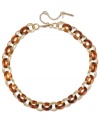 Fashion-forward styling, by Kenneth Cole New York. This chic necklace features interlocking links in gold tone mixed metal and tortoise resin. Approximate length: 16 inches + 3-inch extender. Approximate drop: 1/2 inch.