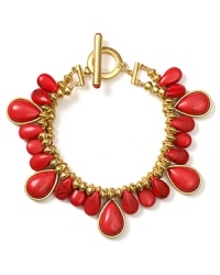 This coral bracelet from Lauren Ralph Lauren looks chic worn on its own or layered up your arm among mismatched favorites. This coral bracelet from Lauren Ralph Lauren looks chic worn on its own or layered up your arm among mismatched favorites.