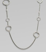 From the Infinity Collection. A signature Yurman box chain of sterling silver is gracefully stationed with cable-and-smooth interlocking rings and sprinkled with tiny white pearls. 5.5mm white cultured freshwater pearls Sterling silver Length, about 44 Toggle closure Imported