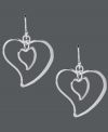 Dress yourself up in love. Touch of Silver's adorable double heart drop earrings feature a unique, asymmetrical design crafted in silver-plated brass. Ear wire crafted in sterling silver for sensitive ears. Approximate drop length: 1 inch. Approximate drop width: 1 inch.