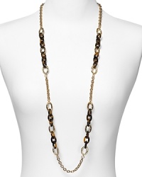 Tap into '70's-inspired elegance with this Lauren Ralph Lauren necklace, which flaunts retro allure with tortoiseshell links. Tap into '70's-inspired elegance with this Lauren Ralph Lauren necklace, which flaunts retro allure with tortoiseshell links.