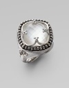An ornate design with a faceted mother-of-pearl doublet, overlaid with a sterling silver clover window and surrounded by a delicate band of dots. Mother-of-pearl doubletsSterling silverWidth, about ¼Imported 