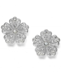 Button up your look in scintillating studs. Eliot Danori's polished style shines with the addition of dozens of round-cut crystals. Set in silver tone mixed metal. Approximate diameter: 3/4 inch. Button up your look in scintillating studs. Eliot Danori's polished style shines with the addition of dozens of round-cut crystals. Set in silver tone mixed metal. Approximate diameter: 3/4 inch.