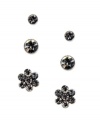 Add sparkle and shine to match any ensemble. GUESS's three pair stud earring set features two pairs of round-cut studs and a sweet pair of flower studs. Crafted in silver tone mixed metal with sparkling clear crystals. Approximate diameters: 7 mm, 5 mm, and 3-1/2 mm.