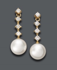Perfect your evening wear with elegant drops. Belle de Mer earrings features a cultured freshwater pearl (8-9 mm) highlighted by four, round-cut diamonds (1/3 ct. t.w.). Crafted in 14k gold. Approximate drop: 3/4 inch. Perfect your evening wear with elegant drops. Belle de Mer earrings features a cultured freshwater pearl (8-9 mm) highlighted by four, round-cut diamonds (1/3 ct. t.w.). Crafted in 14k gold. Approximate drop: 3/4 inch.