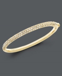 Eye-popping sparkle for any occasion. Eliot Danori bangle features beautiful sparkling crystals in an 18k gold tone mixed metal setting. Approximate diameter: 2-1/4 inches. Eye-popping sparkle for any occasion. Eliot Danori bangle features beautiful sparkling crystals in an 18k gold tone mixed metal setting. Approximate diameter: 2-1/4 inches.