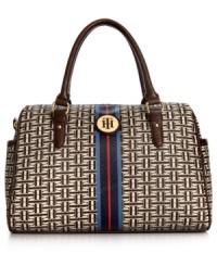 Live la vida logo with this signature print purse from Tommy Hilfiger. The classic satchel design it adorned with golden hardware, monogram plaque and preppy center stripe, while the interior is outfitted with plenty of pockets to keep essentials safe. Live la vida logo with this signature print purse from Tommy Hilfiger. The classic satchel design it adorned with golden hardware, monogram plaque and preppy center stripe, while the interior is outfitted with plenty of pockets to keep essentials safe.