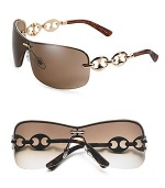 Rimless three-piece mount with marina chain temple. Available in gold frames with brown lens and chocolate frames with gray lens. Metal Made in Italy 