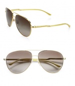 Following the brand's green initiatives, this sustainable design that is a part of the Gold Project created for the 2012 Olympic Games uses raw materials that stem from natural origins, yet retains its chic style with a lightweight metal frame and plastic temples. Available in gold with brown gradient lens. Metal logo temples100% UV protectionImported