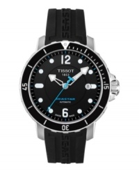 On dry land or underwater, the Seastar 1000 watch from Tissot is ideal for the adventurous gentleman. Crafted of black rubber strap with logo detail and round stainless steel case. Black dial features silver tone dot markers, logo, date window at three o'clock, minute track, silver tone hour and minute hands, blue second hand and numerals at twelve and six o'clock. Includes helium valve for depressurizing watch. Swiss automatic movement. Water resistant to 300 meters. Two-year limited warranty. On dry land or underwater, the Seastar 1000 watch from Tissot is ideal for the adventurous gentleman. Crafted of black rubber strap with logo detail and round stainless steel case. Black dial features silver tone dot markers, logo, date window at three o'clock, minute track, silver tone hour and minute hands, blue second hand and numerals at twelve and six o'clock. Includes helium valve for depressurizing watch. Swiss automatic movement. Water resistant to 300 meters. Two-year limited warranty.