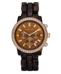 Rose-gold and tortoise make chic your middle name with this Showstopper collection watch by Michael Kors. Rose-gold and tortoise make chic your middle name with this Showstopper collection watch by Michael Kors.