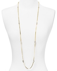 Simply designed and plated in high-shine metal, this Michael Kors link necklace styles every look with classic glamor. Simply designed and plated in high-shine metal, this Michael Kors link necklace styles every look with classic glamor.