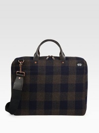 A lightly padded laptop case designed in rugged plaid-check wool with leather handles. Zip closure16L X 12H X 3DImported A lightly padded laptop case designed in rugged plaid-check wool with leather handles. Zip closure16L X 12H X 3DImported
