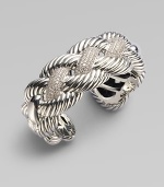 From the Woven Cable Collection. A large, statement piece with diamond accents incorporated into the center of a sterling silver braided design. Diamonds, 2.56 tcwSterling silverHinged closureDiameter, about 2¼Imported 