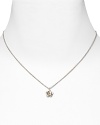A sweet buttercup-inspired flower with a 10K gold center.