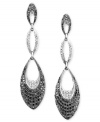 Fanciful fashion fills these fabulous earrings featuring round-cut black diamonds (1-5/8 ct. t.w.) and white diamonds (3/8 ct. t.w.) set in 14k white gold. Approximate drop: 2-1/2 inches.