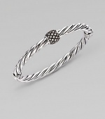 A bold cable bangle of sterling silver, with a rhodium-plated diamond rondelle as its centerpiece. Diamonds, 0.43 tcw Sterling silver and rhodium plating Cable, 6mm Diameter, about 2½ Made in USA