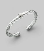 From the White Pavé Collection. An elegant combination of a bold sterling silver cable with sparkling pavé diamonds in the center and 18k white gold accents. Diamonds, 0.25 tcw Sterling silver & 18k white gold Cable, 7mm Diameter, about 2½ Made in USA