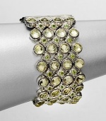 EXCLUSIVELY AT SAKS. From the Irma Collection. Faceted lemon citrine set in a sterling silver multi-row design, accented in complimentary peridot stones. Lemon citrine and peridotSterling silverLength, about 7Push lock closureImported