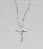 A beautiful cross that sparkles with diamonds in 18k gold on a chain link necklace. Diamonds, .1 tcw18k white goldLength, about 16 to 18 adjustablePendant size, about ½ Lobster clasp closureMade in Italy