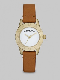 Simply chic timepiece with a luxuriously supple leather strap. Quartz movementWater resistant to 5 ATMRound goldtone stainless steel case, 26mm (1)Logo etched bezelWhite enamel dialSecond hand Tan leather strapImported Simply chic timepiece with a luxuriously supple leather strap. Quartz movementWater resistant to 5 ATMRound goldtone stainless steel case, 26mm (1)Logo etched bezelWhite enamel dialSecond hand Tan leather strapImported
