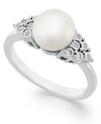 Polished to a T. This simple, yet stunning, ring highlights a cultured freshwater pearls (8 mm) and pretty crown-shaped side accents in diamond. Approximate diameter: 1/2 inch. Polished to a T. This simple, yet stunning, ring highlights a cultured freshwater pearls (8 mm) and pretty crown-shaped side accents in diamond. Approximate diameter: 1/2 inch.