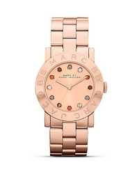 A statement watch is a must for every it-girl, and MARC BY MARC JACOBS glitzy style says glamour. It's sleek design is perfect for the day-to-day, so roll up your sleeves to show off this piece. A statement watch is a must for every it-girl, and MARC BY MARC JACOBS glitzy style says glamour. It's sleek design is perfect for the day-to-day, so roll up your sleeves to show off this piece.