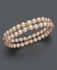 Elevate your look with shimmery pastels. This Charter Club bracelet features two rows of pink simulated plastic pearls crafted in mixed metal. Bracelet stretches to fit wrist. Approximate diameter: 3-1/2 inches. Elevate your look with shimmery pastels. This Charter Club bracelet features two rows of pink simulated plastic pearls crafted in mixed metal. Bracelet stretches to fit wrist. Approximate diameter: 3-1/2 inches.