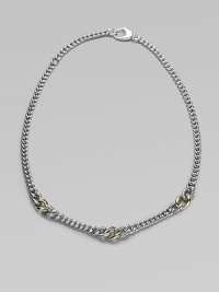 A chunky strand of large and little sterling silver links includes cabled texture links framing ones of smooth 18k gold. Sterling silver and 18k yellow gold Length about 16½ Lobster clasp Made in Italy A chunky strand of large and little sterling silver links includes cabled texture links framing ones of smooth 18k gold. Sterling silver and 18k yellow gold Length about 16½ Lobster clasp Made in Italy