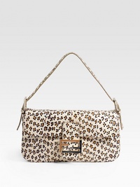An exotic iteration of the iconic silhouette, features vibrant leopard spots on luxurious watersnake.Shoulder strap, 5 drop Flap closure One inside zip pocket Linen lining 11W X 5½H X 2D Made in Italy An exotic iteration of the iconic silhouette, features vibrant leopard spots on luxurious watersnake.Shoulder strap, 5 drop Flap closure One inside zip pocket Linen lining 11W X 5½H X 2D Made in Italy