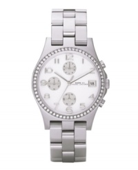Sit pretty and sophisticated with this chic Henry watch by Marc by Marc Jacobs. Stainless steel bracelet and round case. Bezel embellished with crystal accents. White chronograph dial features applied silvertone numerals at markers, date window at three o'clock, three silvertone subdials, three hands and subtle logo. Quartz movement. Water resistant to 30 meters. Two-year limited warranty. Sit pretty and sophisticated with this chic Henry watch by Marc by Marc Jacobs. Stainless steel bracelet and round case. Bezel embellished with crystal accents. White chronograph dial features applied silvertone numerals at markers, date window at three o'clock, three silvertone subdials, three hands and subtle logo. Quartz movement. Water resistant to 30 meters. Two-year limited warranty.