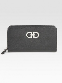 Style meets functionality in this clean design of rich Saffiano leather. Zip-around closureOne center zip coin compartment, two billfold sectionsEight credit card slotsLeather lining7½W X 4H X 1DMade in Italy Style meets functionality in this clean design of rich Saffiano leather. Zip-around closureOne center zip coin compartment, two billfold sectionsEight credit card slotsLeather lining7½W X 4H X 1DMade in Italy
