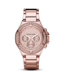 A Swarovski crystal encrusted bezel lends chic shine to this luxe rose-gold tone watch with three eye-functionality. From MICHAEL Michael Kors. A Swarovski crystal encrusted bezel lends chic shine to this luxe rose-gold tone watch with three eye-functionality. From MICHAEL Michael Kors.