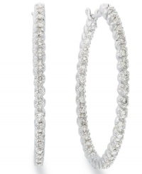 Sparkle that shines from the inside out! These hoop earrings are decorated on both sides with round-cut diamonds (1 ct. t.w.) for ultimate shine. Set in 14k white gold. Approximate diameter: 31 mm. Sparkle that shines from the inside out! These hoop earrings are decorated on both sides with round-cut diamonds (1 ct. t.w.) for ultimate shine. Set in 14k white gold. Approximate diameter: 31 mm.