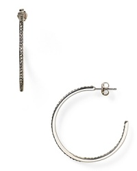 These striking Judith Jack hoop earrings work a simple vibe, but they're exquisitely crafted too-finished in sterling silver with marcastite stone accents. These striking Judith Jack hoop earrings work a simple vibe, but they're exquisitely crafted too-finished in sterling silver with marcastite stone accents.