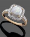 Iridescent cushion-cut opal (9/10 ct. t.w.) illuminates your look on this 14k gold ring with diamond accents.