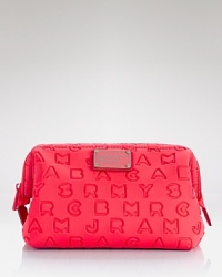 The perfect spot to stash the pretty stuff, this MARC BY MARC JACOBS cosmetics case is a bolder breed, crafted of coolly textured neoprene. The perfect spot to stash the pretty stuff, this MARC BY MARC JACOBS cosmetics case is a bolder breed, crafted of coolly textured neoprene.