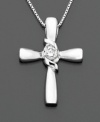 A single round-cut diamond (1/10 ct. t.w.) makes Sirena's cross pendant dazzle. Set in 14k white gold. Approximate length: 18 inches. Approximate drop: 1 inch.