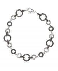 Wrap your wrists in chic, circular style. Judith Jack bracelet features glittering marcasite and crystals set in sterling silver. Approximate length: 7-1/4 inches. Wrap your wrists in chic, circular style. Judith Jack bracelet features glittering marcasite and crystals set in sterling silver. Approximate length: 7-1/4 inches.