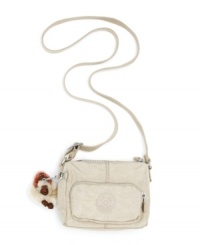 Kipling's Tedros crossbody purse shows off your sporty side, in durable, modern 420 denier nylon. Kipling's Tedros crossbody purse shows off your sporty side, in durable, modern 420 denier nylon.