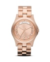 A cool logo plaque details this MARC BY MARC JACOBS watch, which is classically styled in plated metal and set on a matching bracelet.