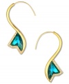Piercing elegance, by RACHEL Rachel Roy. These chic teal-colored glass earrings curl toward fierce fashion with crystal accents. Crafted in worn gold tone mixed metal. Approximate drop: 2-1/4 inches. Approximate diameter: 7/8 inch.