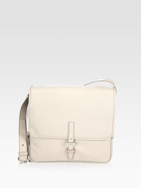 Saffiano leather messenger bag with a textured finish and an adjustable shoulder strap for maximum versatility.Flap, buckle closureAdjustable shoulder strapInterior zip pocketsLeather13W x 11H x 4DMade in Italy Saffiano leather messenger bag with a textured finish and an adjustable shoulder strap for maximum versatility.Flap, buckle closureAdjustable shoulder strapInterior zip pocketsLeather13W x 11H x 4DMade in Italy