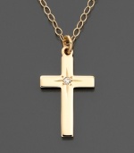 A lovely and meaningful gift, this 14k gold dainty cross pendant features a pretty diamond accent.