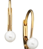 These dainty 14k gold leverback earrings are adorned with a single luminous cultured pearl.