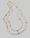 Long enough to double, this single strand necklace of 18k gold links is dotted with a colorful array of faceted semi-precious gemstones, including tourmaline, quartz, peridot, rhodolite, garnet, iolite, tanzanite, aquamarine, apatite, topaz, citrine and amethyst. Gemstones 18k yellow gold Length, about 47¼ Lobster clasp Made in Italy