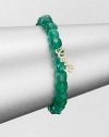 A sparkling diamond charm in 14k gold on a green onyx stretch bead bracelet. Green onyx14K goldDiamonds, .12 tcwLength, about 6.5Slip-on styleImported 