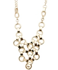 Lovely links. GUESS's intricate bib-style necklace adds the drama factor with its pretty gold tone mixed metal setting and chunky design. Approximate length: 16 inches + 2-inch extender. Approximate drop: 3-1/4 inches. Lovely links. GUESS's intricate bib-style necklace adds the drama factor with its pretty gold tone mixed metal setting and chunky design. Approximate length: 16 inches + 2-inch extender. Approximate drop: 3-1/4 inches.